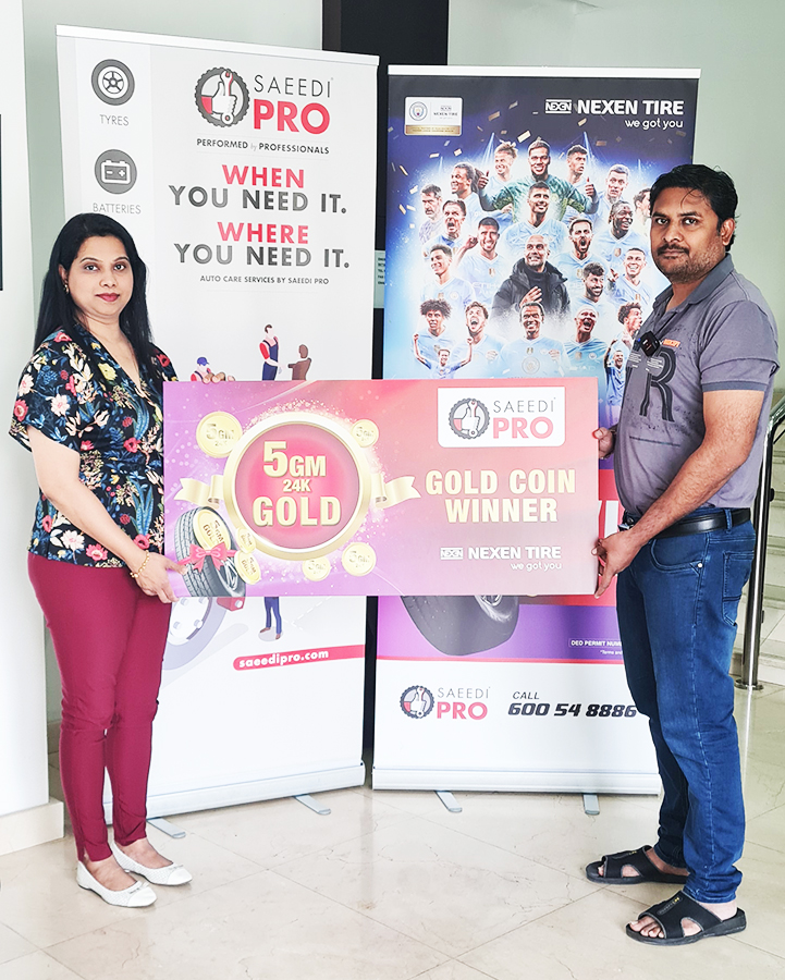 Saeedi Pro Nexen Tire Winner Holding Gold Coin Prize in Dubai