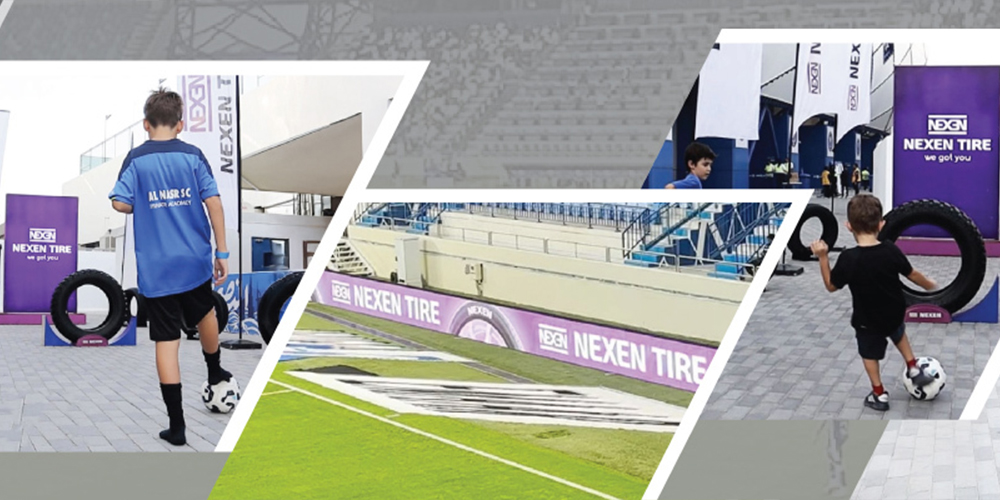NEXEN Tires fan activation football challenge zone at Al Nasr Stadium Dubai with supporters participating in tire goal games