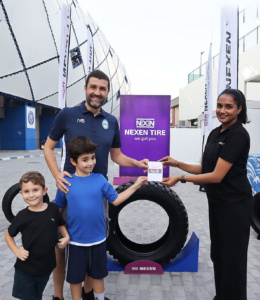 NEXEN Tires fan activation football challenge zone at Al Nasr Stadium Dubai with supporters participating in tire goal games