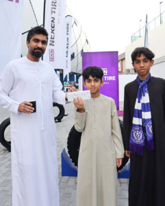 NEXEN Tires fan activation football challenge zone at Al Nasr Stadium Dubai with supporters participating in tire goal games