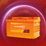 Saeedi Pro technician using a digital tester to check a battery's Cold Cranking Amps (CCA) and health status in a Dubai workshop.