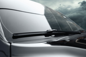 A car driving on Sheikh Zayed Road (E11) with clean windshield wipers installed by Saeedi Pro.